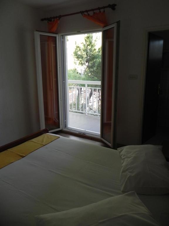 Posteľ alebo postele v izbe v ubytovaní Apartment Sveta Nedilja 11433a