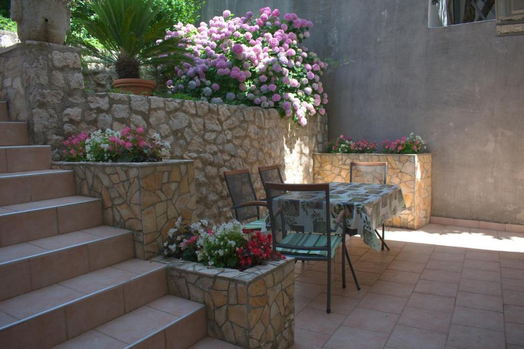Fotografia z galérie ubytovania Apartments by the sea Podgora, Makarska - 13864 v Podgore