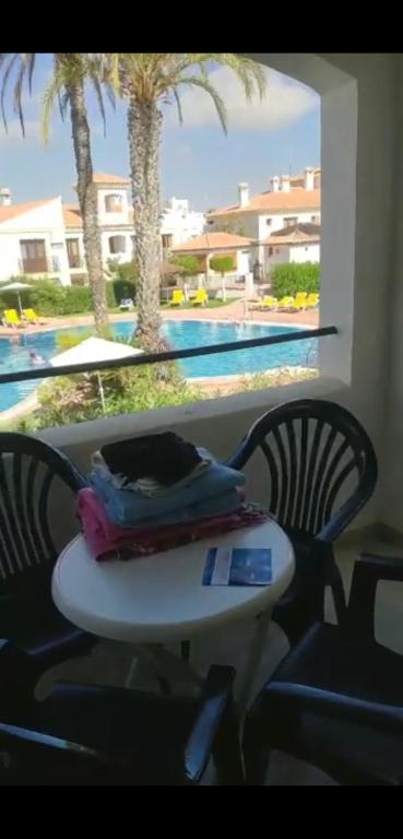 Basen w obiekcie Apartamento jardines tropicales dos piscinas vera playa las marinas urbanización vera coast lub w pobliżu
