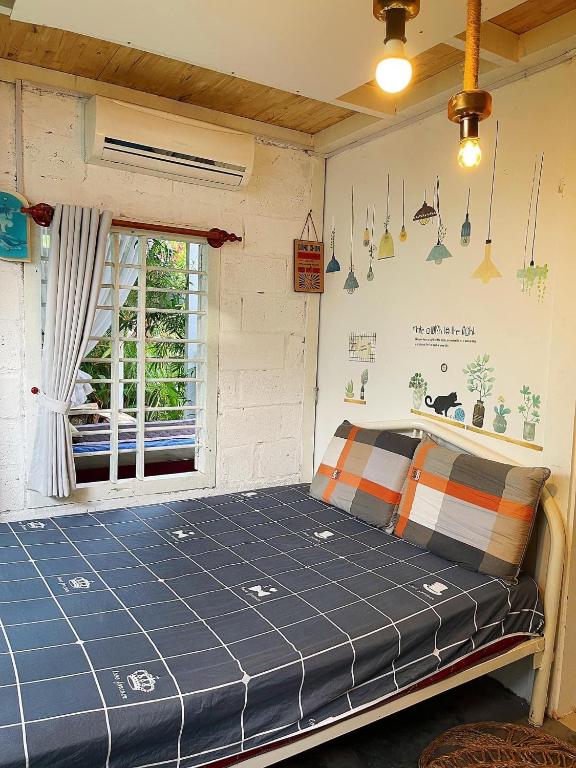 Giường trong phòng chung tại BinhYen Homestay