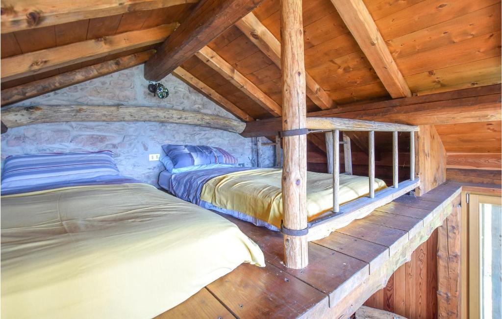 A bed or beds in a room at Amazing Home In Lamon With Wifi