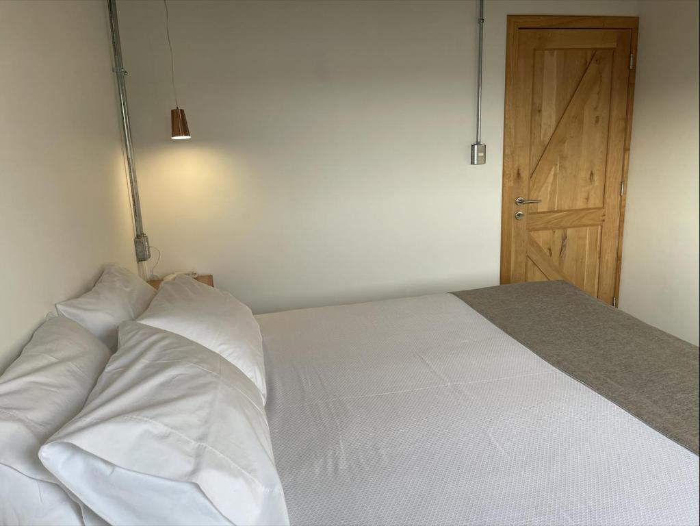 Postel nebo postele na pokoji v ubytování Hotel Big Sur