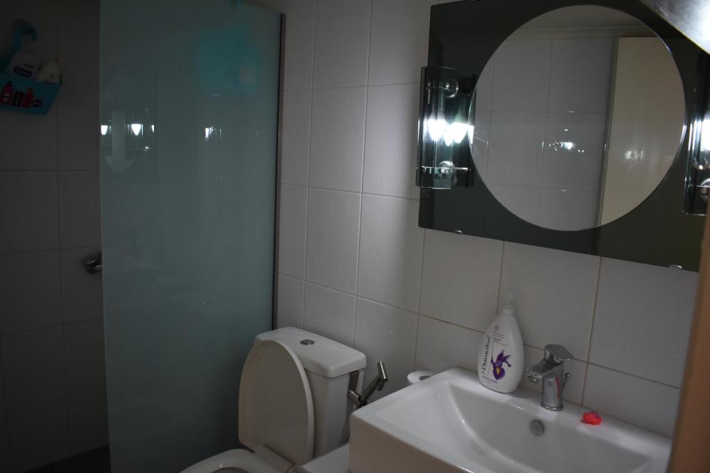 A bathroom at Nia's apartment by the sea
