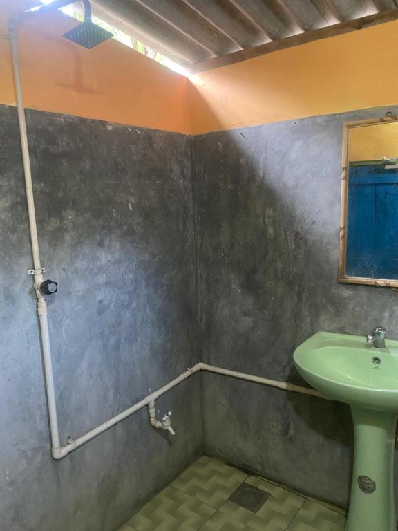 Koupelna v ubytování Coco Hostels - Arugambay