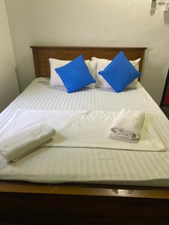 Postel nebo postele na pokoji v ubytování Coco Hostels - Arugambay