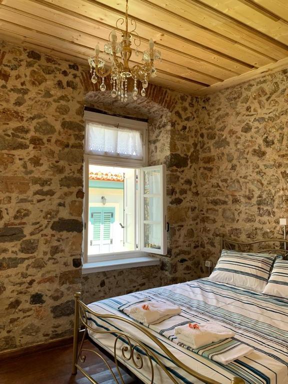 Postel nebo postele na pokoji v ubytování 1830 Chateau