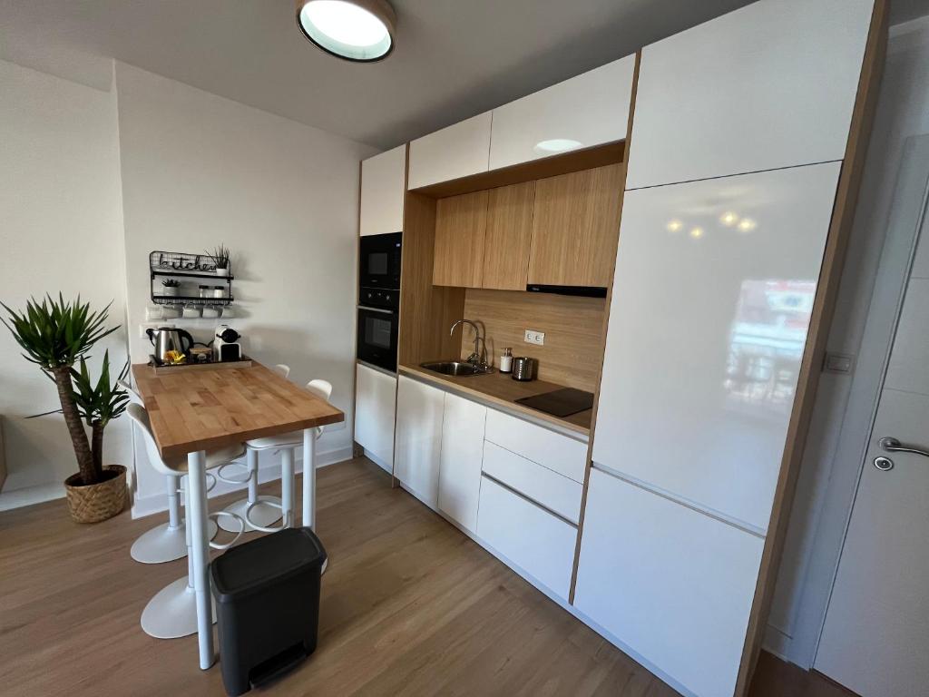 Kuchyň nebo kuchyňský kout v ubytování Wonderful Loft, parking free V