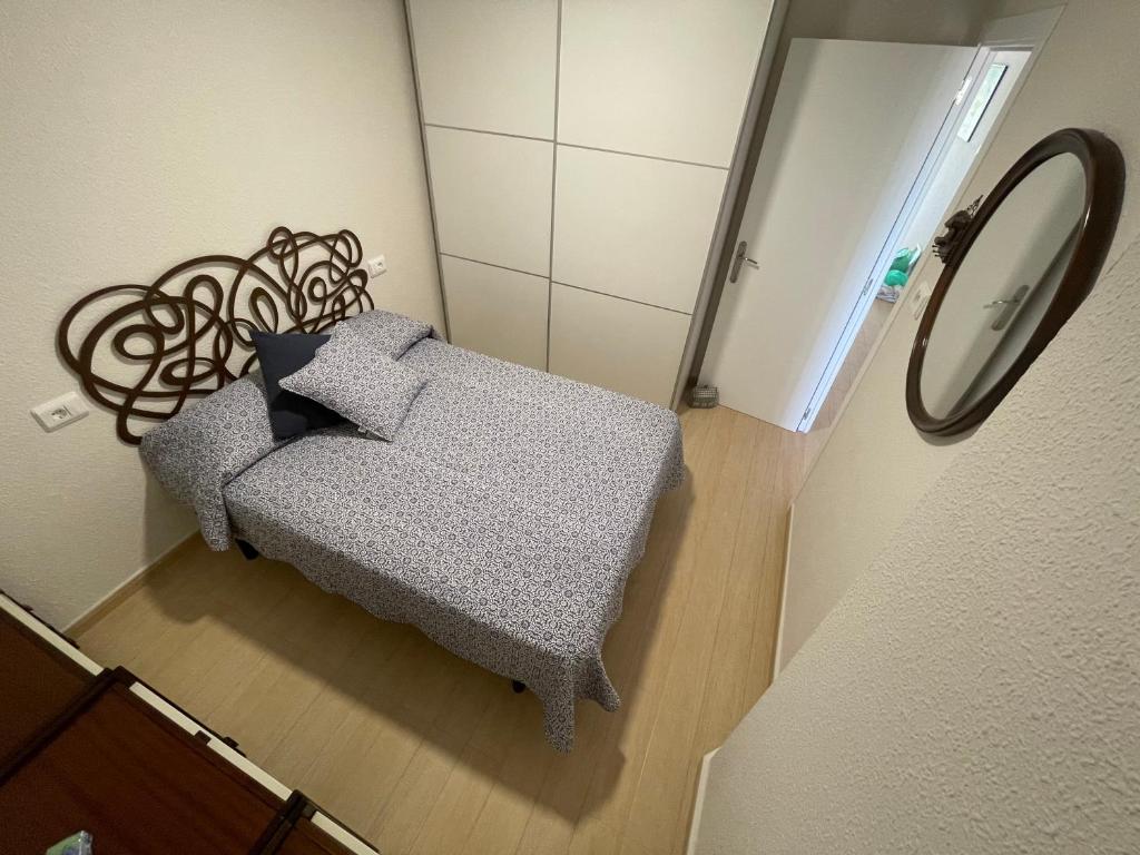 Postel nebo postele na pokoji v ubytování Peñismar 50