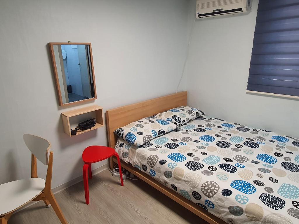 Postel nebo postele na pokoji v ubytování Bunk Backpackers Guesthouse