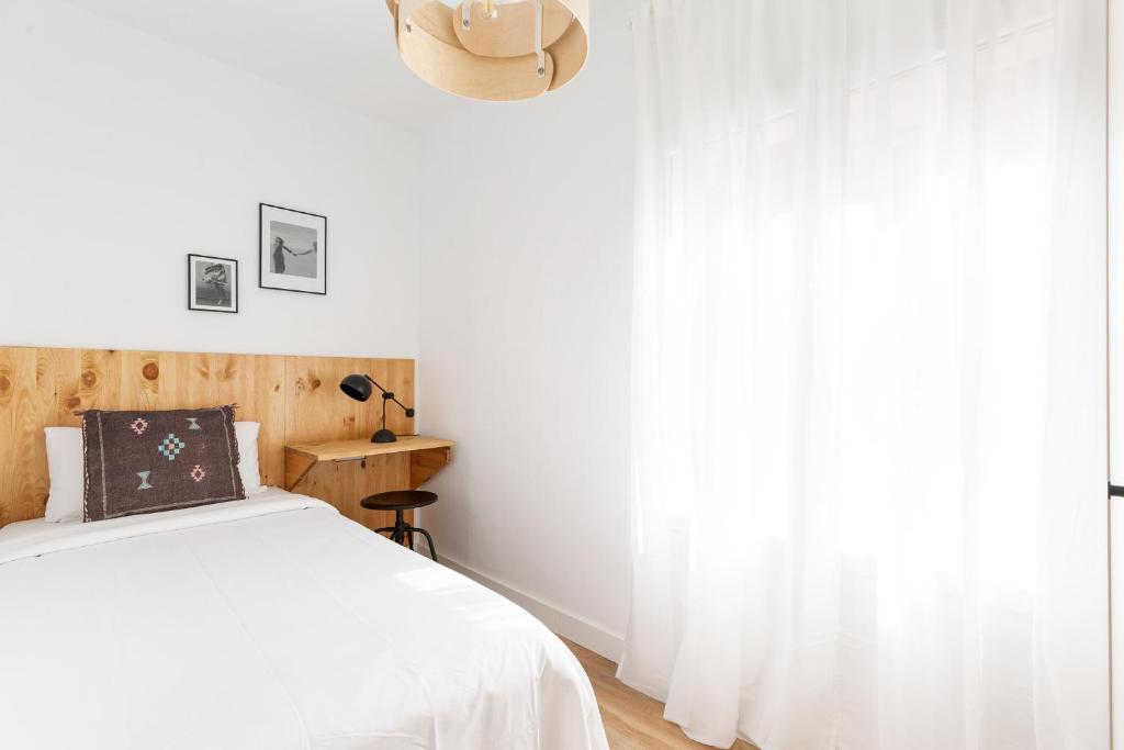 Posteľ alebo postele v izbe v ubytovaní WOW Apartments by Olala Homes