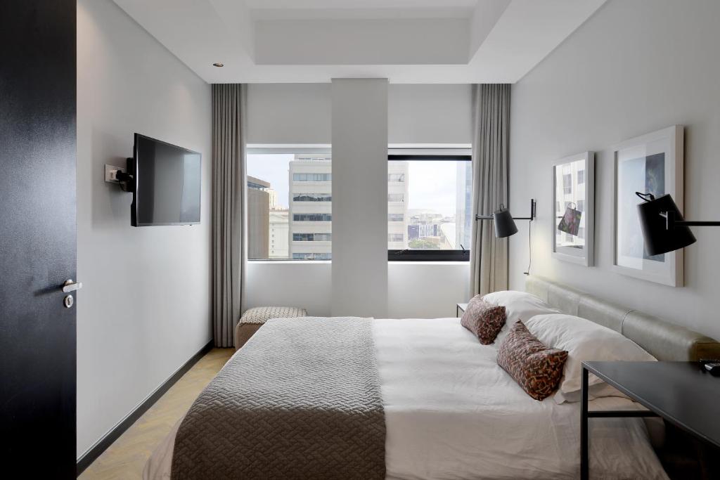 Postel nebo postele na pokoji v ubytování Lovely 1 bedroom rental unit close to the V&A Waterfront