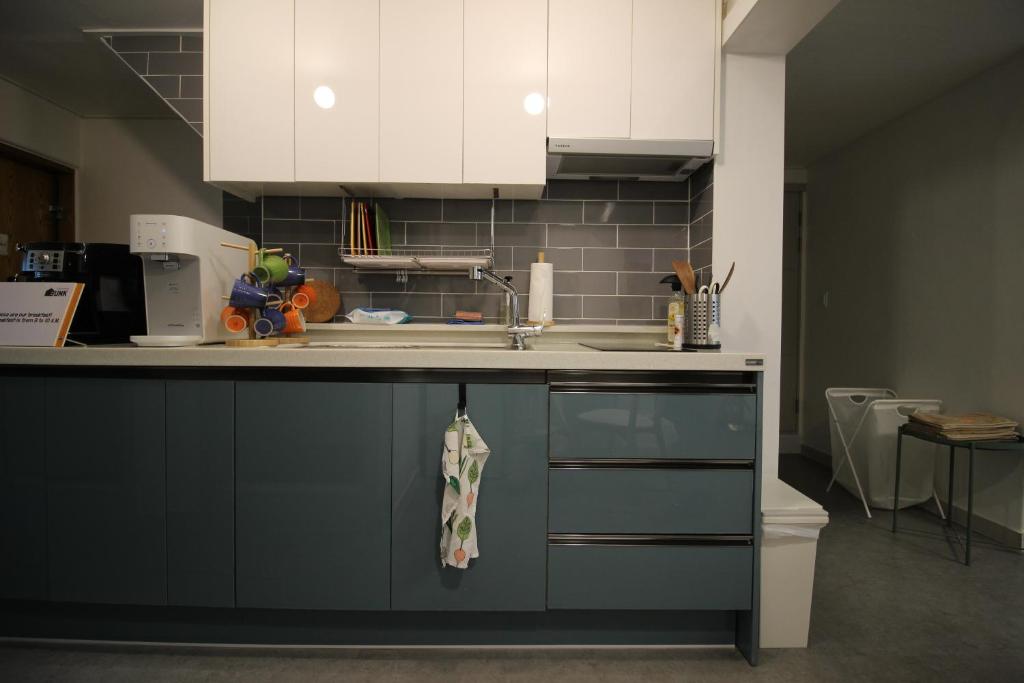 Kuchyň nebo kuchyňský kout v ubytování Bunk Backpackers Guesthouse