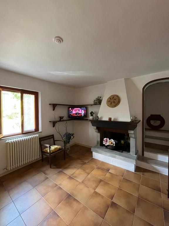 TV a/nebo společenská místnost v ubytování Casa Lastri