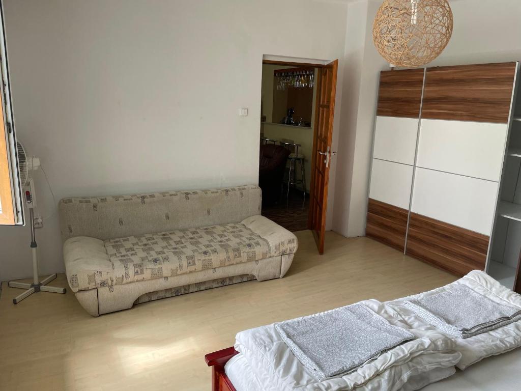 Postel nebo postele na pokoji v ubytování Villa Bodiky