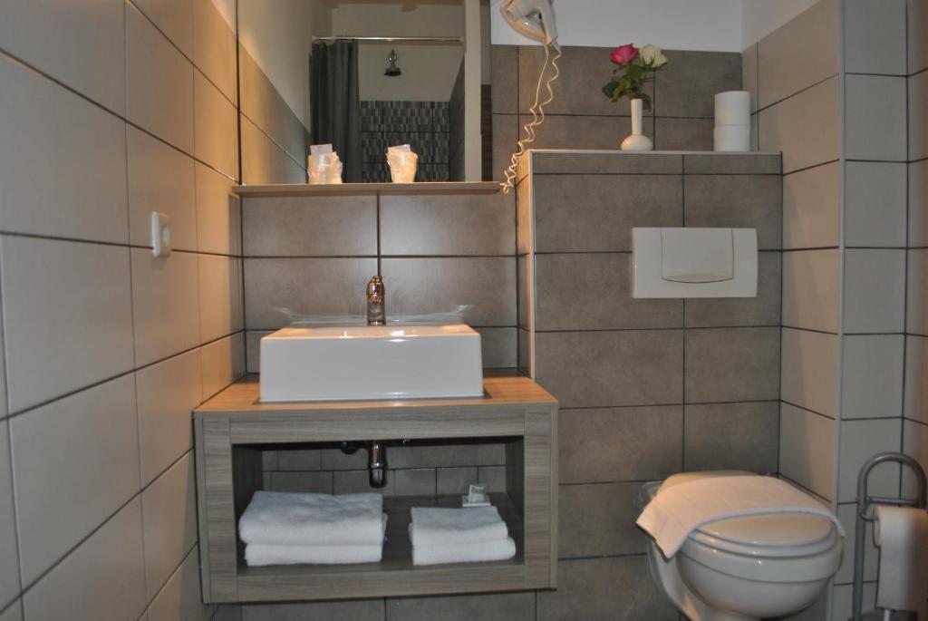Koupelna v ubytování Auberge Gaglioti