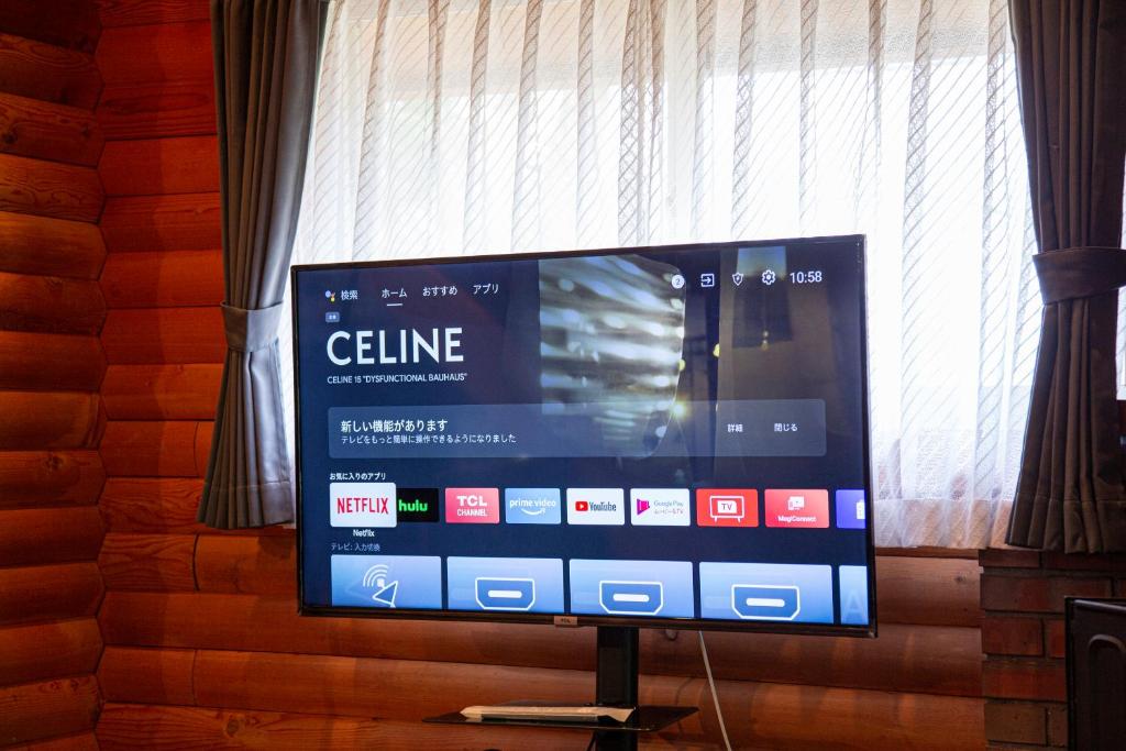 TV a/nebo společenská místnost v ubytování 月の街60号北軽井沢