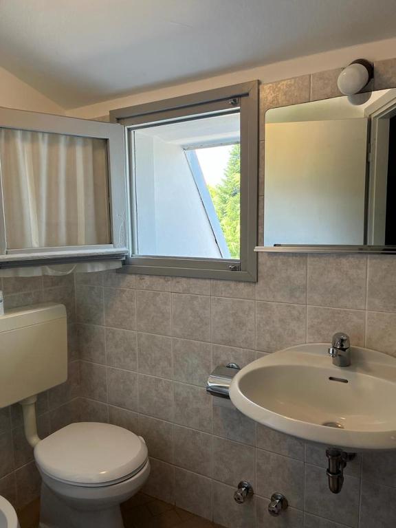 Koupelna v ubytování Hotel Aurora