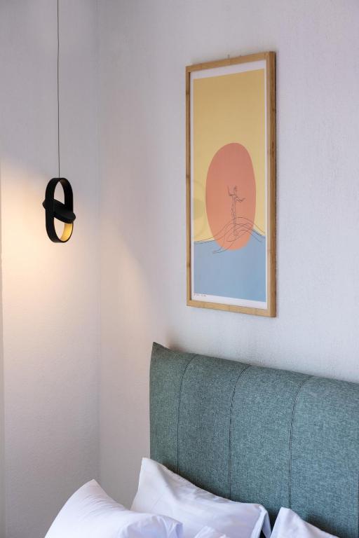 Postel nebo postele na pokoji v ubytování Aiora Suites
