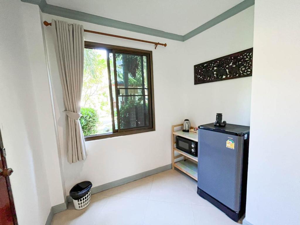 Cuisine ou kitchenette dans l'établissement TropiCoco Beach Resort Koh Phangan