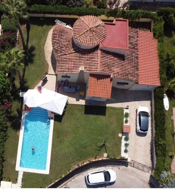 an aerial view of a house with a swimming pool at Villa Tranquila in Alcossebre