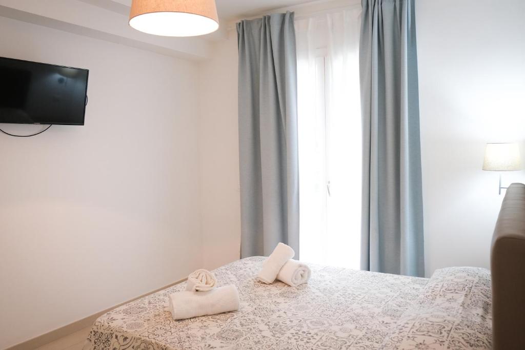 Posteľ alebo postele v izbe v ubytovaní Residence Chanel
