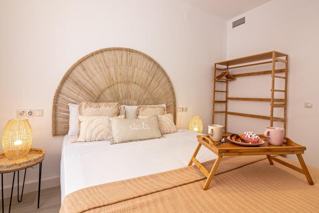 Posteľ alebo postele v izbe v ubytovaní Malaga Center Flat Holidays City Center