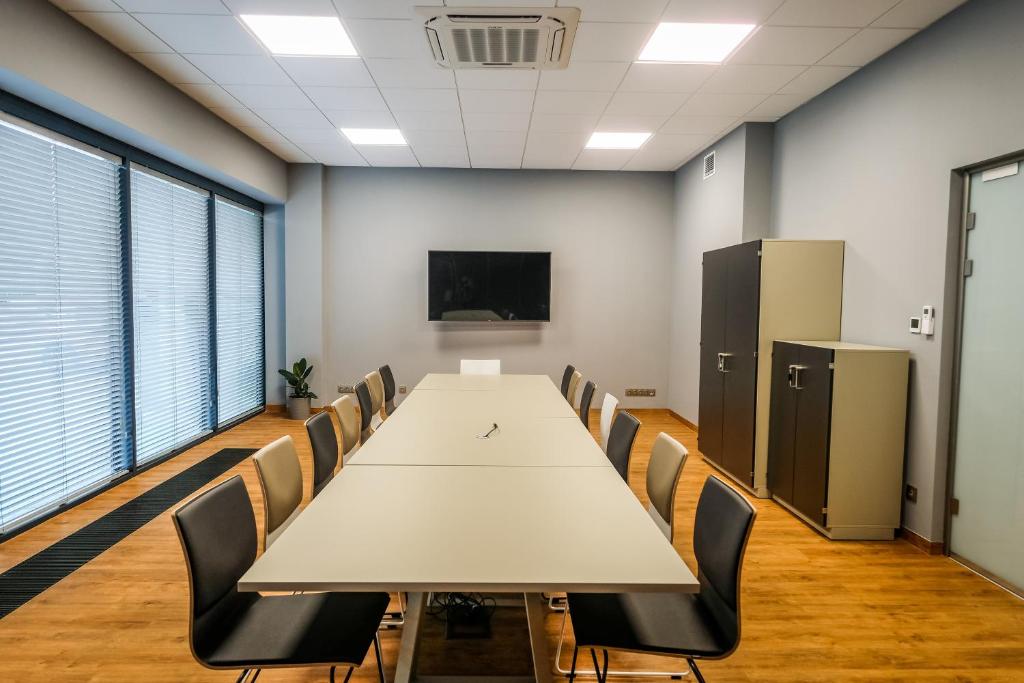 TV a/nebo společenská místnost v ubytování Hotel Gem