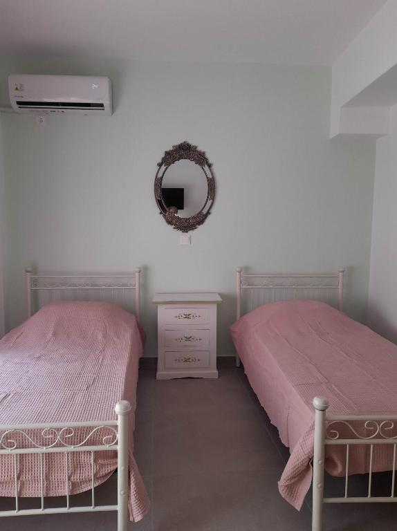 Ένα ή περισσότερα κρεβάτια σε δωμάτιο στο Cosy