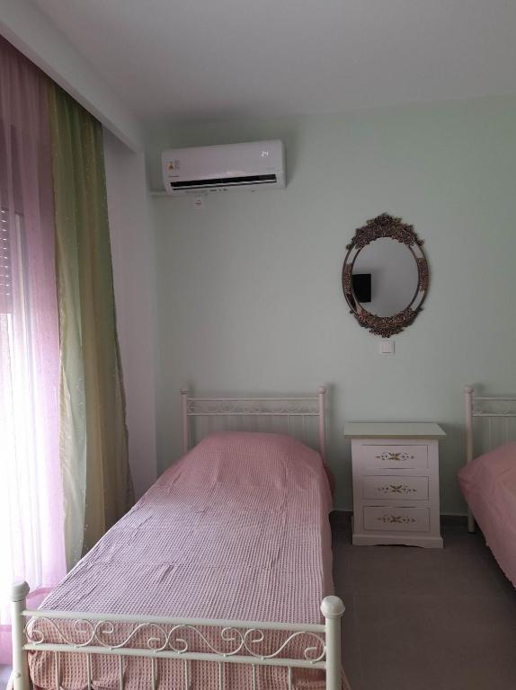 Ένα ή περισσότερα κρεβάτια σε δωμάτιο στο Cosy