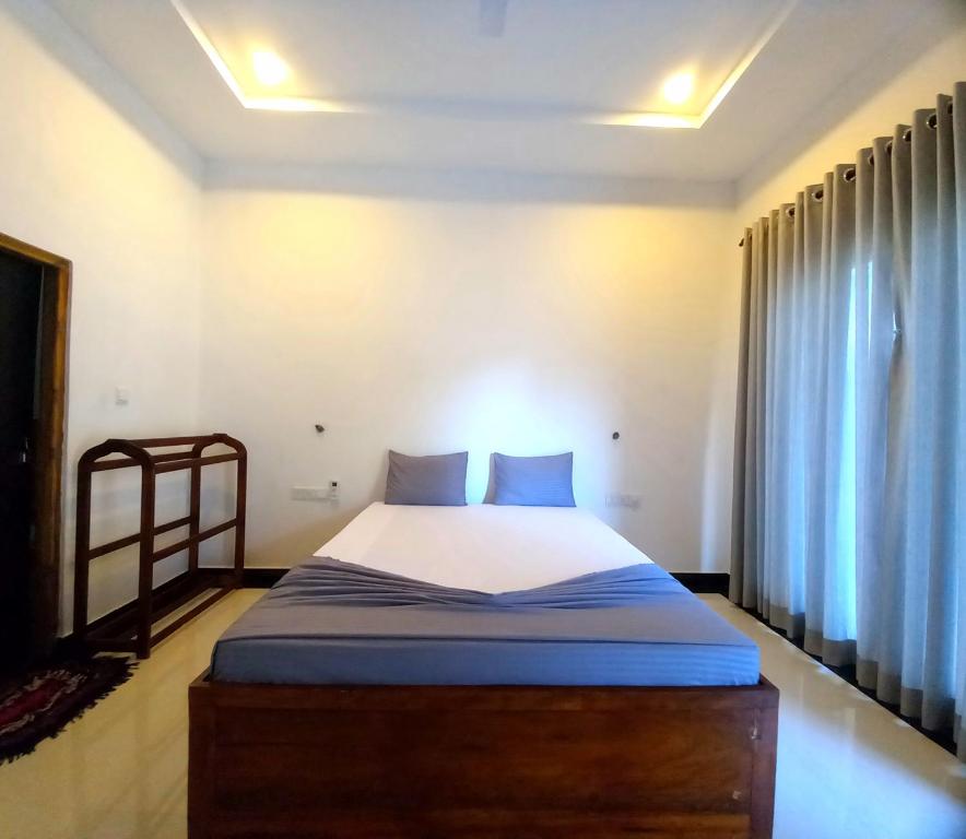 Postel nebo postele na pokoji v ubytování Hotel krish