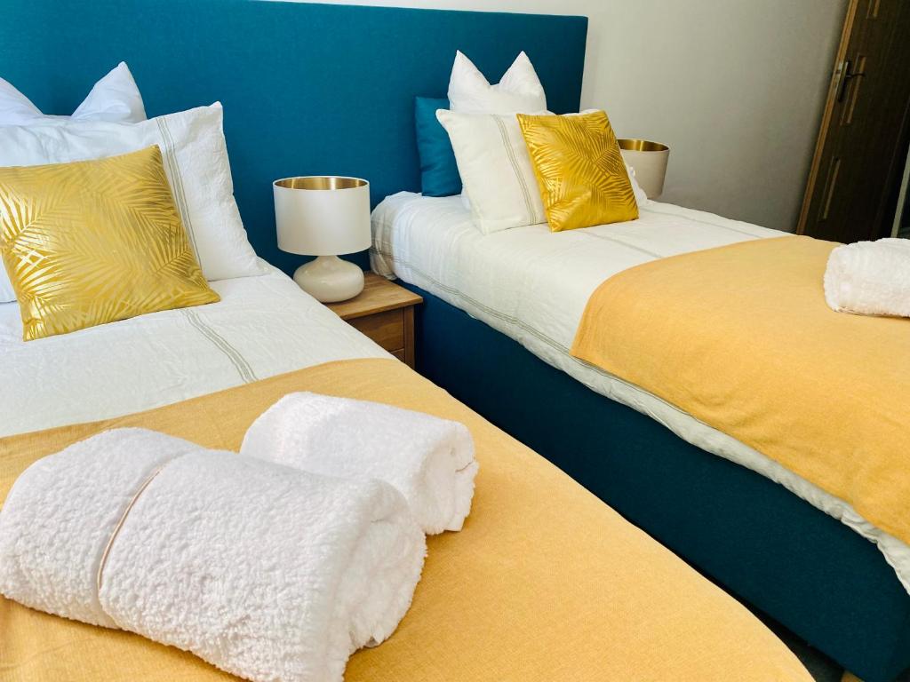 Posteľ alebo postele v izbe v ubytovaní Apartament KonDor Shekspir