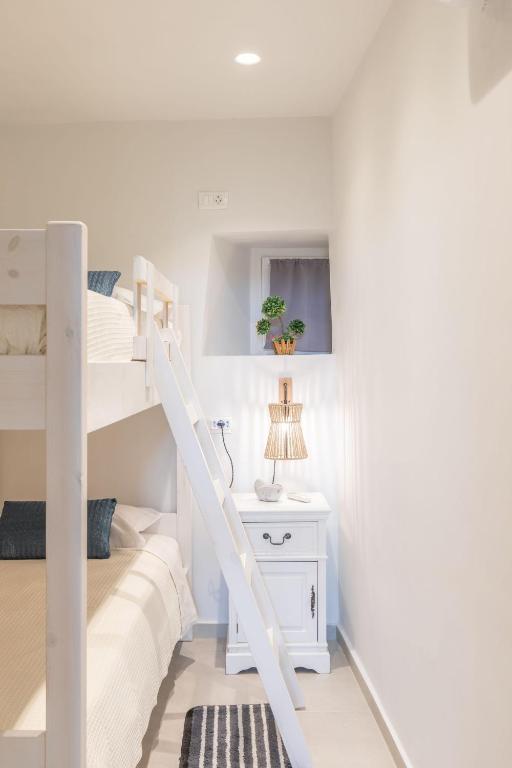 Marno Mykonos Apartment客房内的一张或多张床位