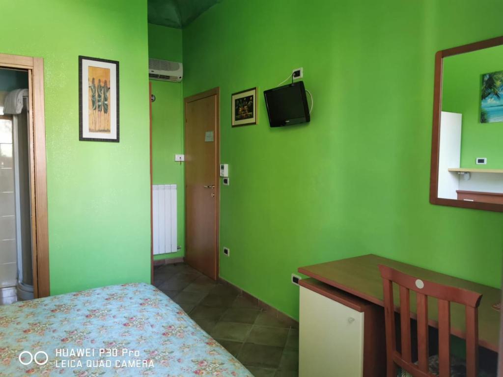 TV a/nebo společenská místnost v ubytování Porto Recanati Zimmer