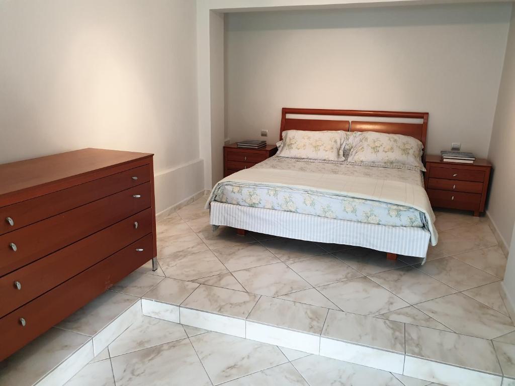 Postel nebo postele na pokoji v ubytování HOUSE SUITES DOMAINE