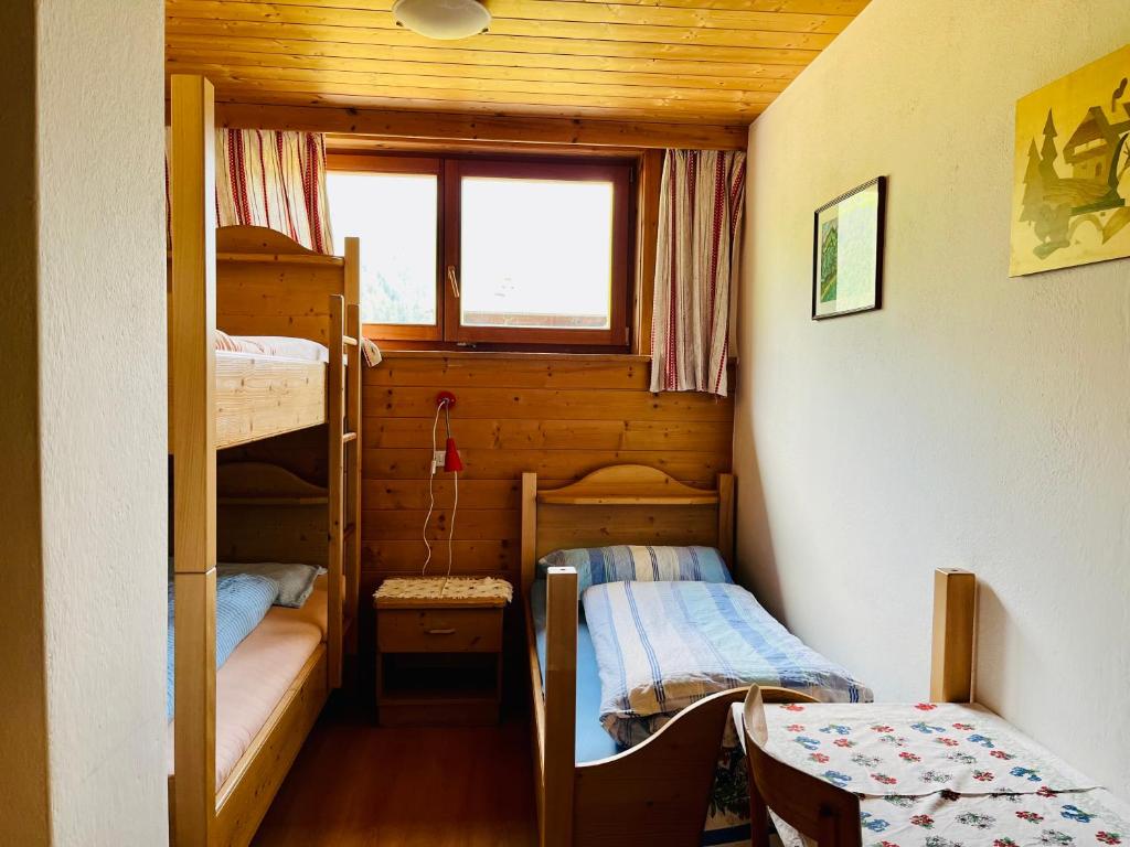 Postel nebo postele na pokoji v ubytování Bruggerhof