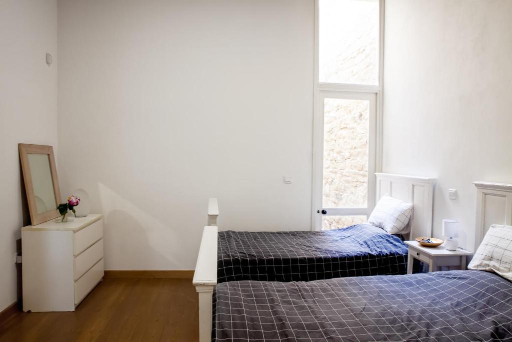 Postel nebo postele na pokoji v ubytování MeMeraki Artist Residency