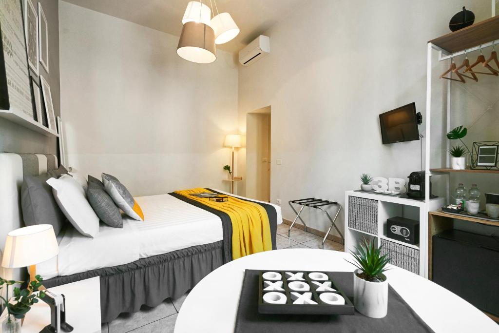 Posteľ alebo postele v izbe v ubytovaní 3B Bed & Breakfast Firenze Centro