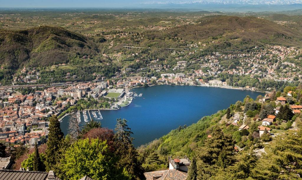 an aerial view of a lake in a city at Hotel Vista Lago in Brunate