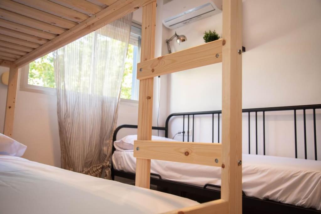 Posteľ alebo postele v izbe v ubytovaní Piso con Jardín