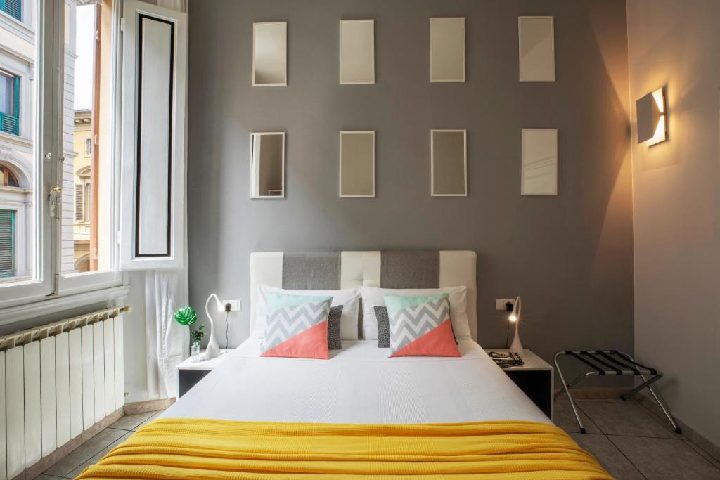 Posteľ alebo postele v izbe v ubytovaní 3B Bed & Breakfast Firenze Centro