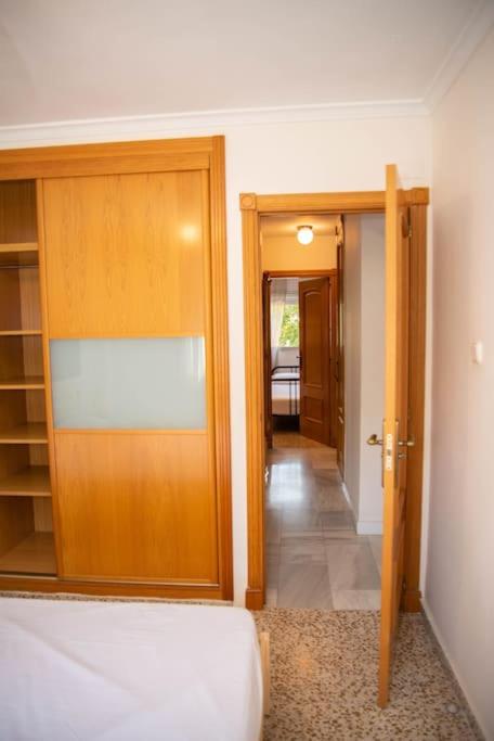 Posteľ alebo postele v izbe v ubytovaní Piso con Jardín