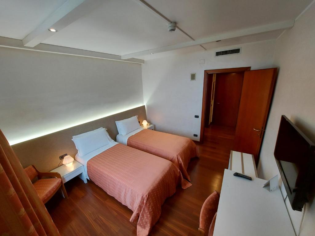 TV a/nebo společenská místnost v ubytování Hotel Posta 77