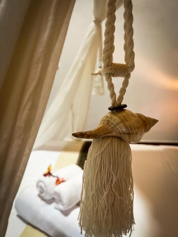 Postel nebo postele na pokoji v ubytování Griyatama Bungalow