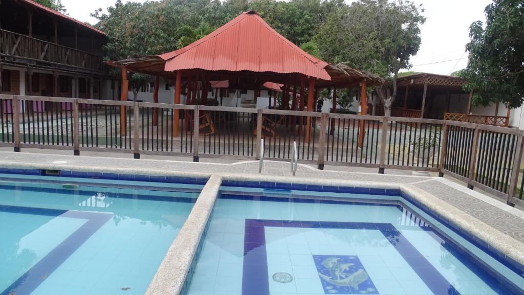 Bazén v ubytování Hotel Casa Finca La Maracuya nebo v jeho okolí
