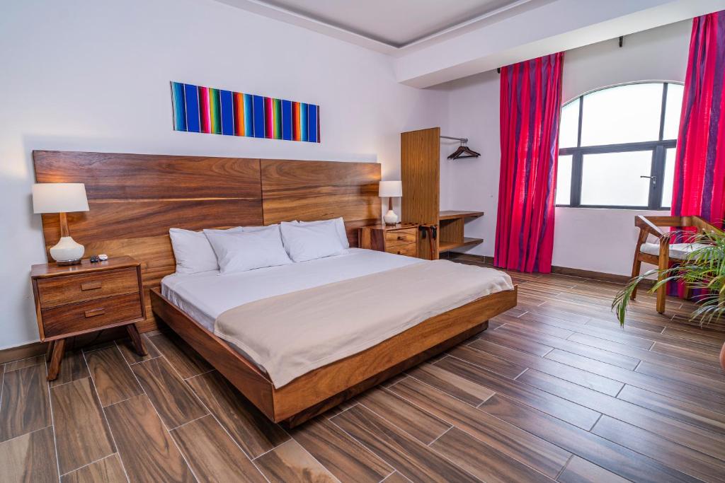 Postel nebo postele na pokoji v ubytování Nomads Party Hotel
