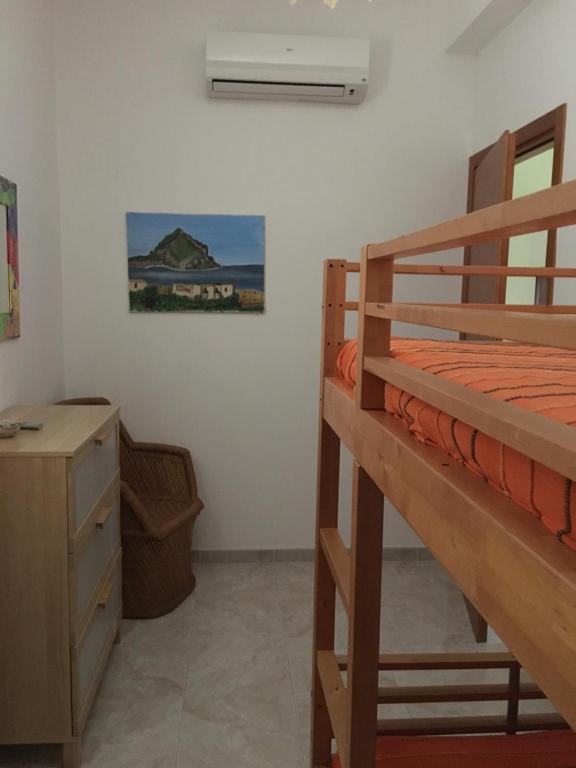 Łóżko lub łóżka w pokoju w obiekcie Casa VISTA MARE