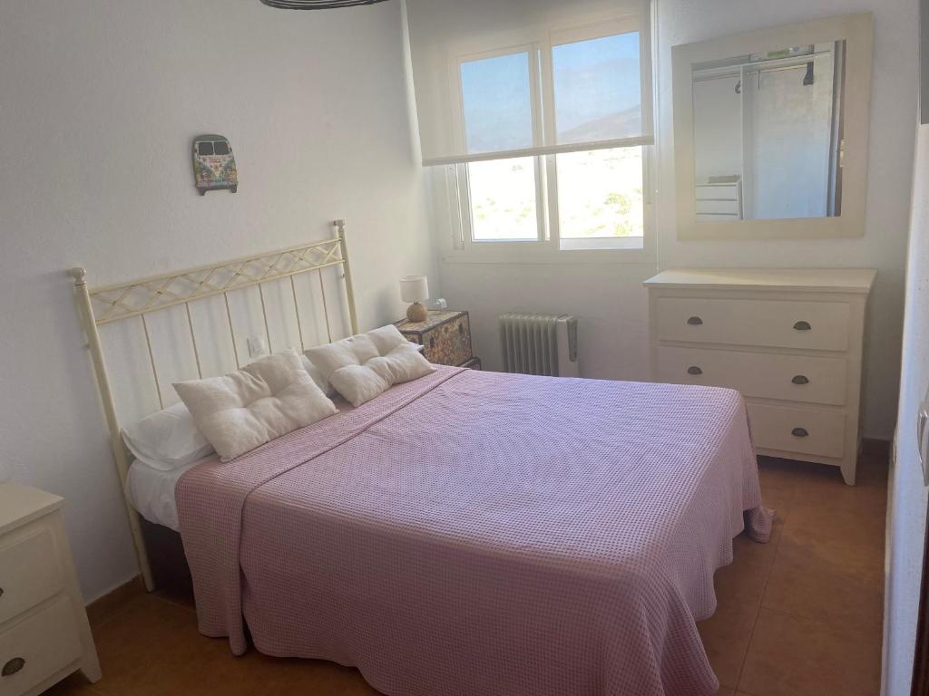 Postel nebo postele na pokoji v ubytování Apartamento Tarifamar con piscina y aparcamiento