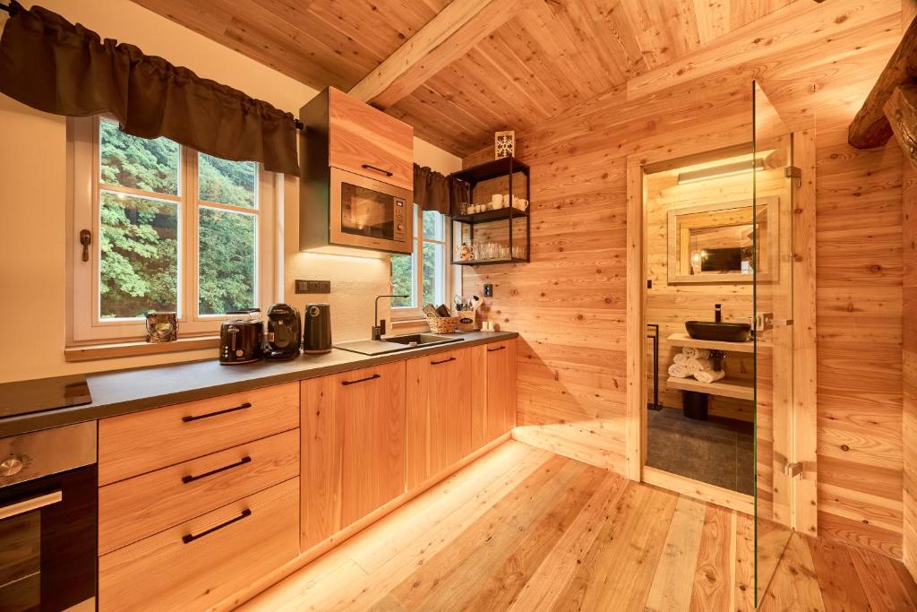 Kuchyň nebo kuchyňský kout v ubytování Apartmány CHALLUPA