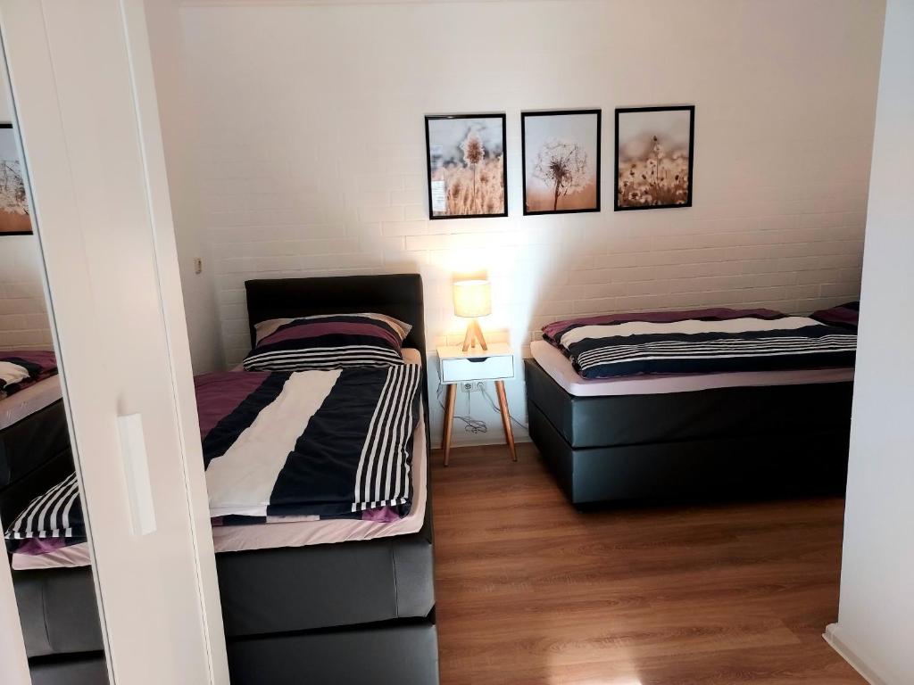 Postel nebo postele na pokoji v ubytování Apartment 2 Unter den Eichen