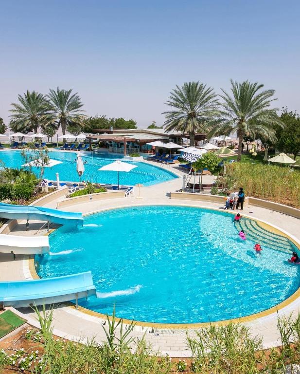 Bazén v ubytování Oryx Grand Hotel Jebel Hafeet nebo v jeho okolí